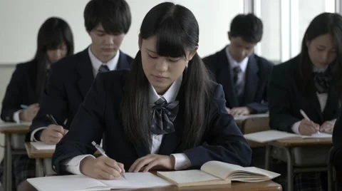 Japanese high-school students studying in the classroom Stock Footage 58932353