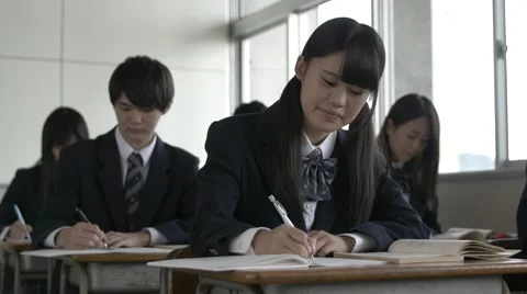 Japanese high-school students studying in the classroom Stock Footage 58932365