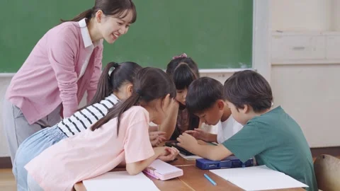 Japanese kids studying in the class Stock Footage 297819954