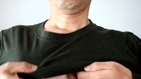 Japanese man getting dressed Stock Footage 327887713