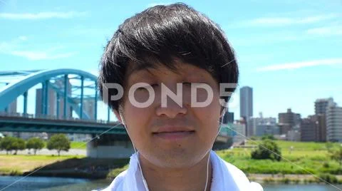 JAPANESE MAN making funny faces. Stock Photos