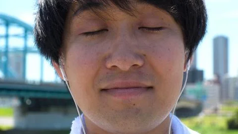 JAPANESE MAN making funny faces. Stock Photos