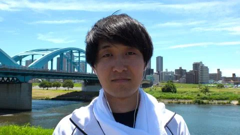 JAPANESE MAN staring at camera. Stock Photos
