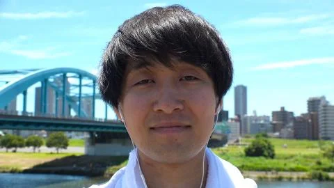 JAPANESE MAN staring at camera. Stock Photos