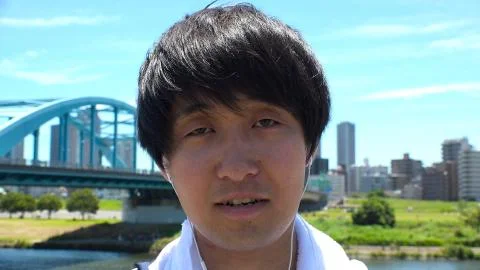 JAPANESE MAN staring at camera. Stock Photos