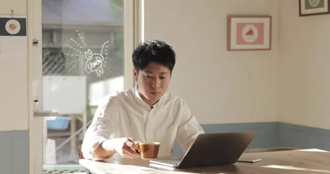Japanese man using laptop at a cafe Video stock 152197265