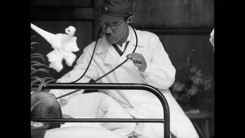 Japanese Military Nurse And Doctor Attend Patient In Hospital Bed Stock Footage