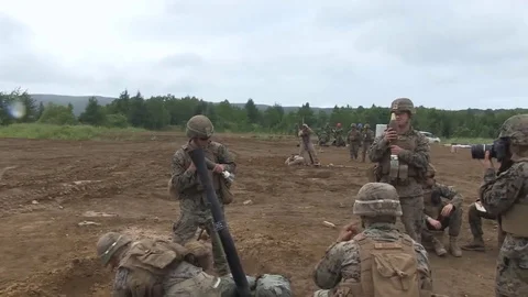 Japanese Mortar Command, charges a mine and shoots Video stock 121791446