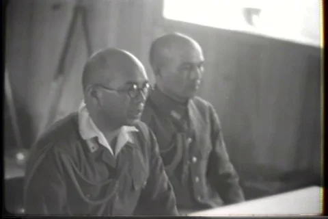 Japanese representatives at table surrender document with Japanese text - 1945 스톡 동영상 93844236