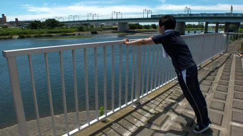 JAPANESE RUNNER MAN doing push ups. Stock Photos