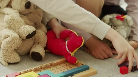 Japanese Sisters Playing with Stuffed Animals at Home Stock Footage 332834053