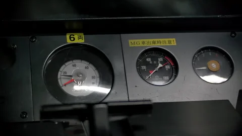 Japanese train driver cab close up on accelerometer control panel with no conduc 動画素材 244052765