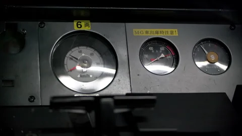 Japanese train driver cab close up on accelerometer control panel with no conduc 動画素材 244052769