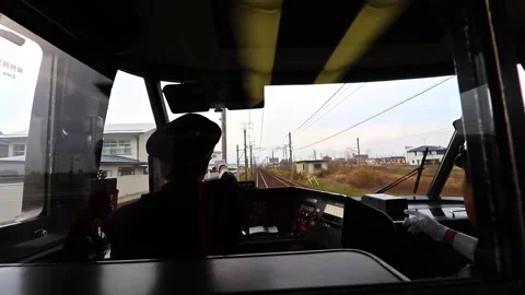 Japanese train driver (conductor) operating the train in the driver room Stock-Footage 158753539
