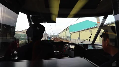 Japanese train driver (conductor) operating the train in the driver room Stock Footage 158753550