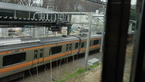 Japanese Train Passing Through City View From Window 库存影片 333467482