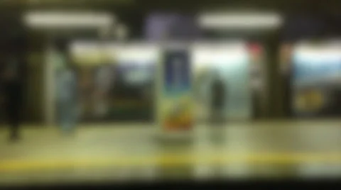 Japanese train pulling out of station, slowly coming into focus Stock Footage 35008890