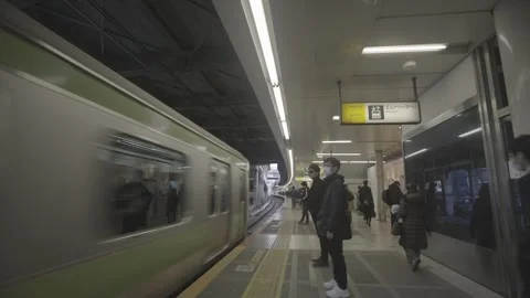 JAPANESE TRAIN STATION -  PLATFORM SCENE 2 - UNGRADED Stock Footage 304097043
