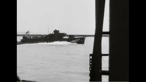 Japanese troop on ship and fires with naval gun - 1943 Stock Footage 92794053