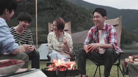 Japanese young friends enjoying camping Stock Footage 169508570