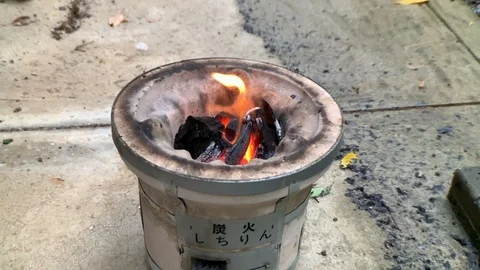 Japanse fire pit  called “shichirin” prepared for “yakitori” Stock Footage 108377734