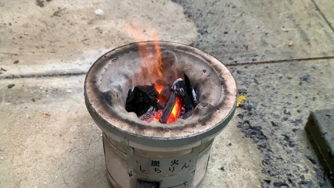 Japanse fire pit  called “shichirin” prepared for “yakiniku” Stock Footage 108377737