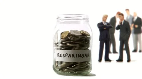 A jar being emptied of coins Stock Footage 11285400