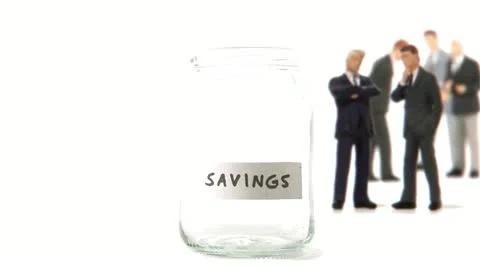 A jar being filled with coins Stock-Footage 11285537