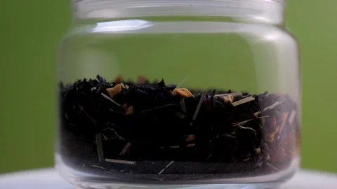 Jar of black tea rotating Stock Footage 129004340