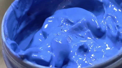 Jar with blue paint close-up, background. Stock Footage 305997725
