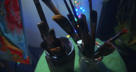 Jar with brushes in art studio Stock Footage 148200066