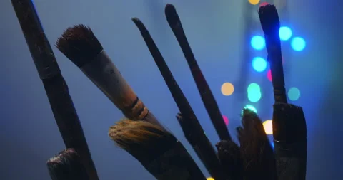 Jar with brushes in art studio Stock Footage 148204995