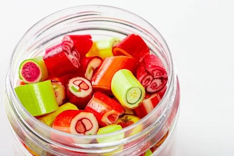 Jar of candy fruit candies close up Stock Photos