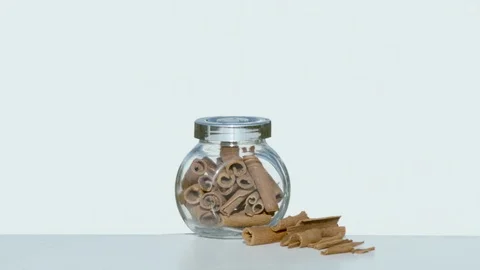 Jar with cinnamon sticks exploding, Ultra Slow Motion 스톡 동영상 86578730