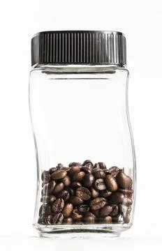 Jar with coffee grains Stock Photos