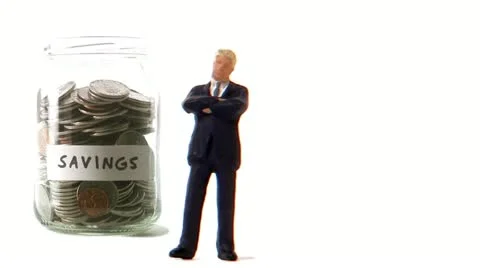 A jar with coins that decreases Video stock 11285541