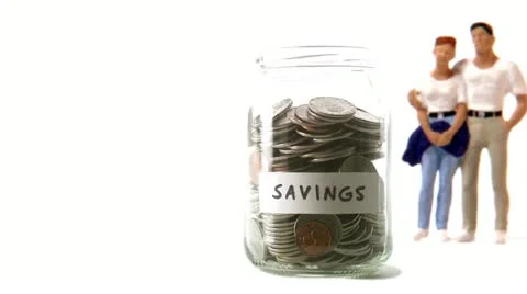 A jar with coins that decreases Video stock 11285545