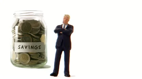A jar with coins that decreases Video stock 11285566