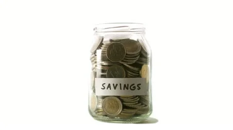 A jar with coins that decreases Video stock 11285577