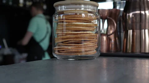A jar of cookies on a bar close-up Stock Footage 248538388