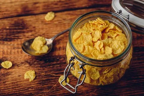 Jar of corn flakes for breakfast Stock Photos