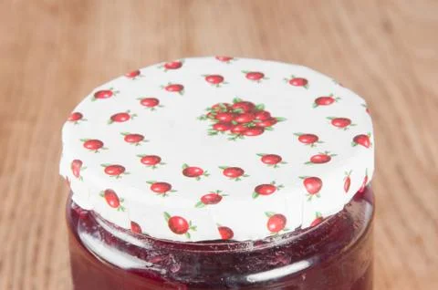 Jar of cranberry jam Stock Photos