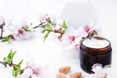 Jar with cream on a light background. Stock Photos