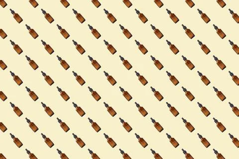 Jar with drip dispenser seamless pattern on gentle background. 库存照片