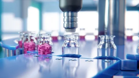 Jar filling with tablets on a packaging line in a pharmaceutical factory - .. Stock Footage 243800323