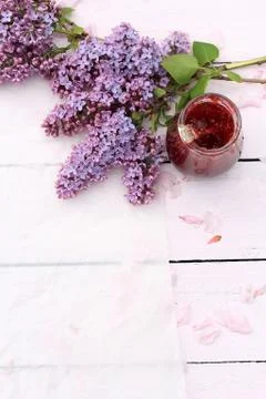 A jar of fresh raspberry jam on light rustic background, close up, in the gar Stock Photos