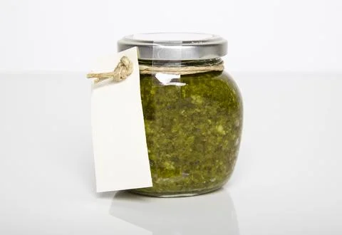 A jar of green herby paste 写真素材
