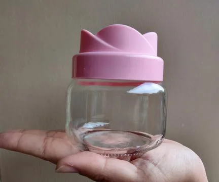 Jar in hand Stock Photos