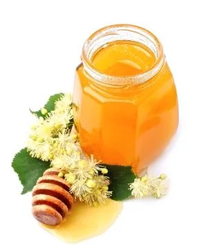 Jar of honey on white closeup Foto stock