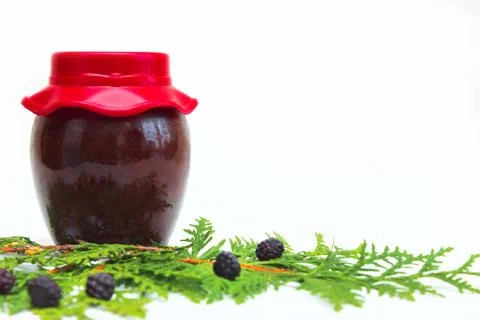 Jar with jam on white background Stock Photos